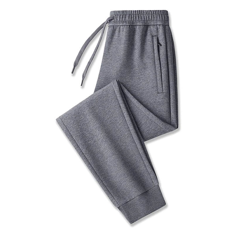 Dark gray, tight cuff Men's Tech Jogger Pants with Elastic Waistband & Zip Pockets