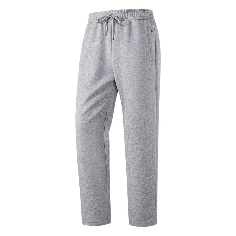 Men's Tech Jogger Pants with Elastic Waistband & Zip Pockets - Slim Fit Front Solo