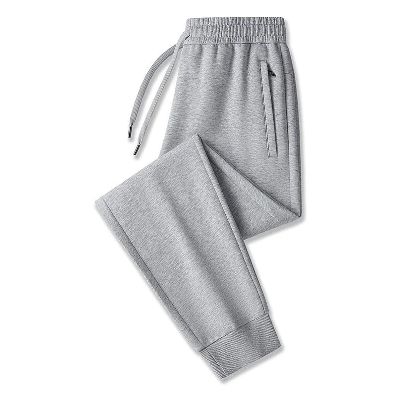 Light Grey Slim Fit Men's Tech Jogger Pants with Elastic Waistband & Zip Pockets