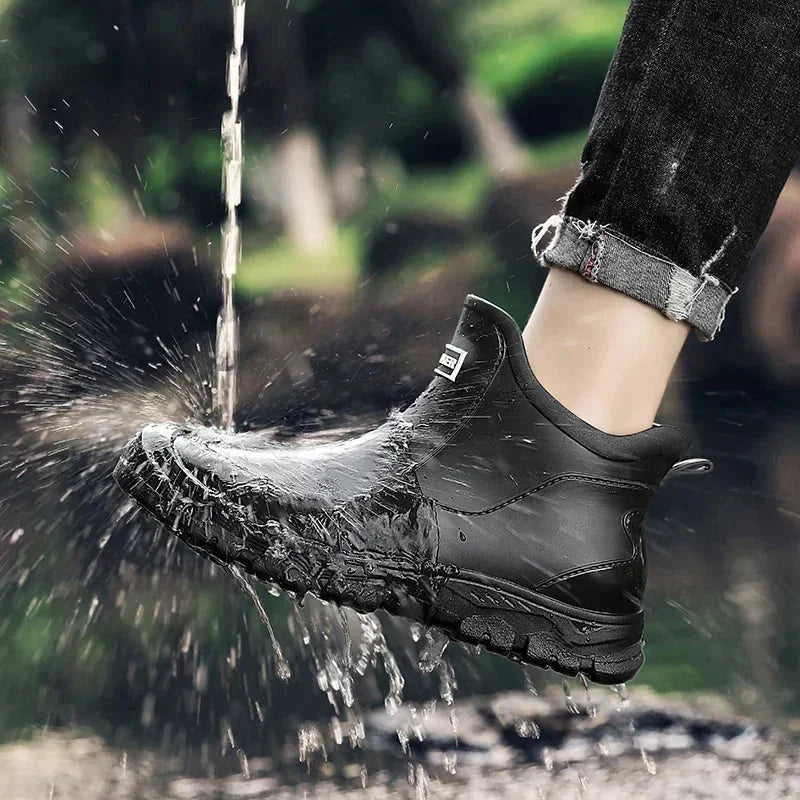 Black Men's Waterproof Rain Boots — Carrie Cushioned Slip-On - Worn Water Splash