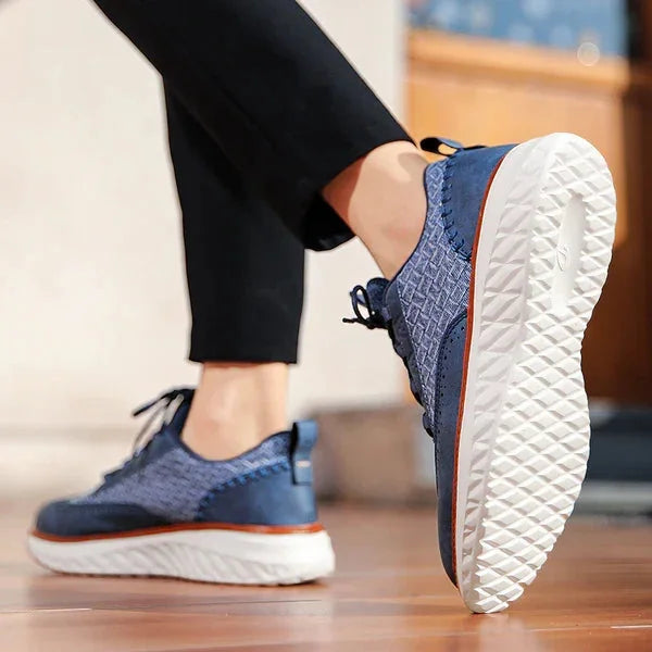 Blue Men's Casual Woven Leather Sneaker — Lillian Lace-Up Wingtip Brogue - Worn Walking Motion